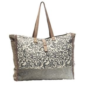 Myra Weekender Bag in Floral Print with cowhide and canvas.